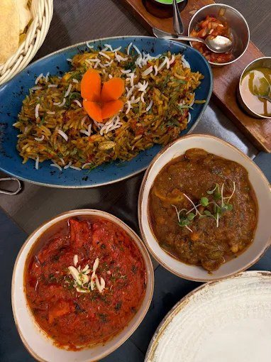 Biryani y currys de la cocina india de Annapurna Tandoori